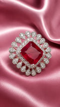 Silver-tone halo statement ring with red square center stone and clear gemstone border