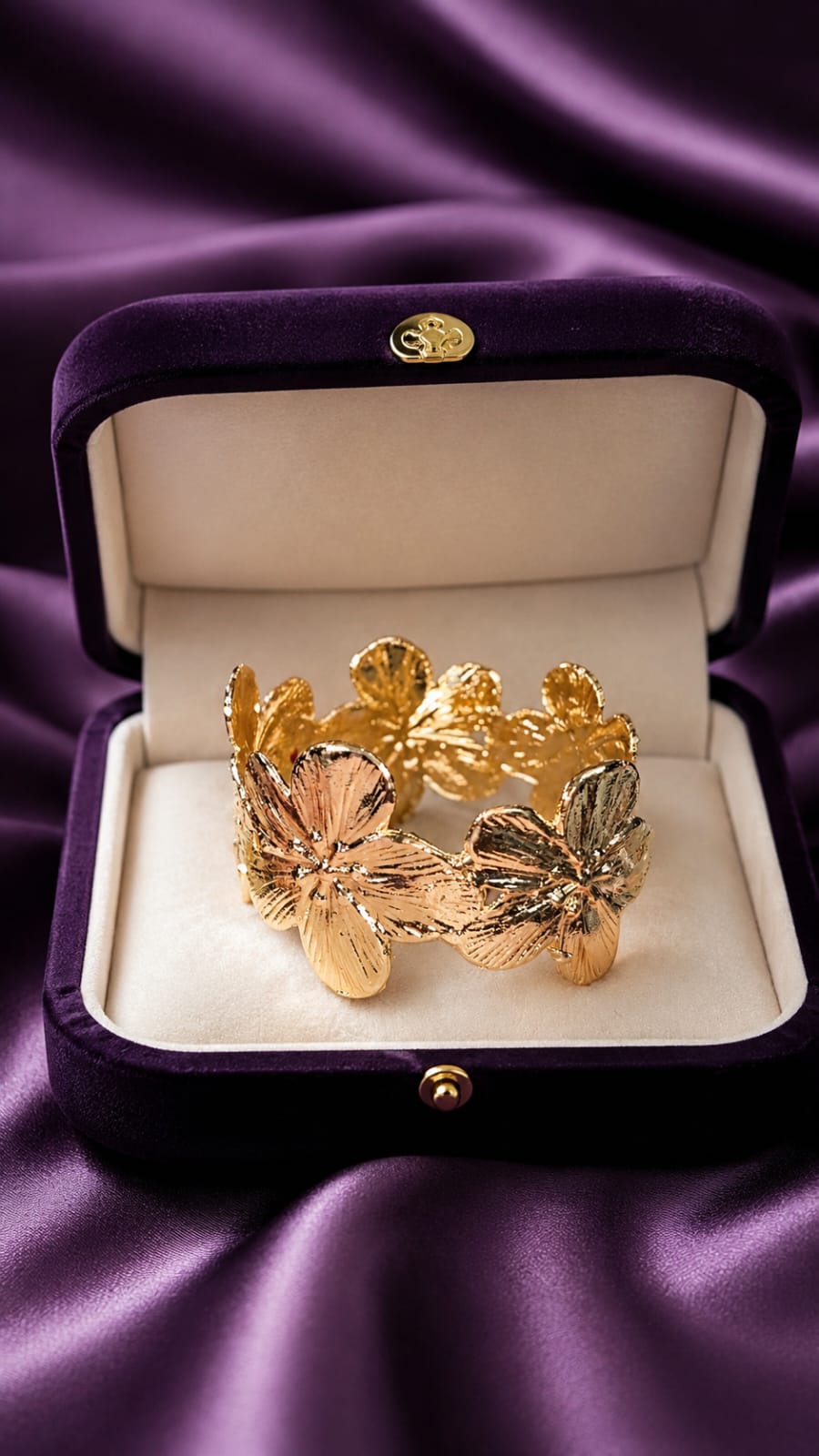 Gold floral statement cuff bracelet with textured flower petals