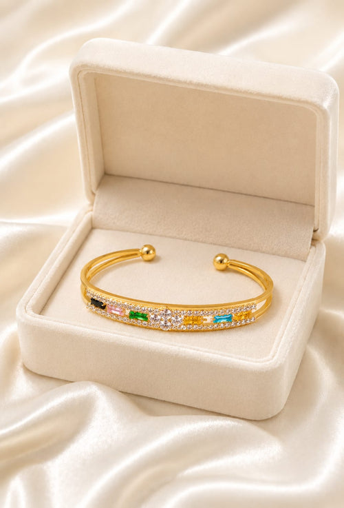 Gold-plated crystal cuff bracelet with multicolor stones and ball end clasps in box