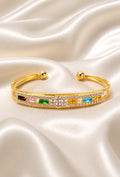 Gold-plated crystal cuff bracelet with multicolor stones, hinged ball end clasps