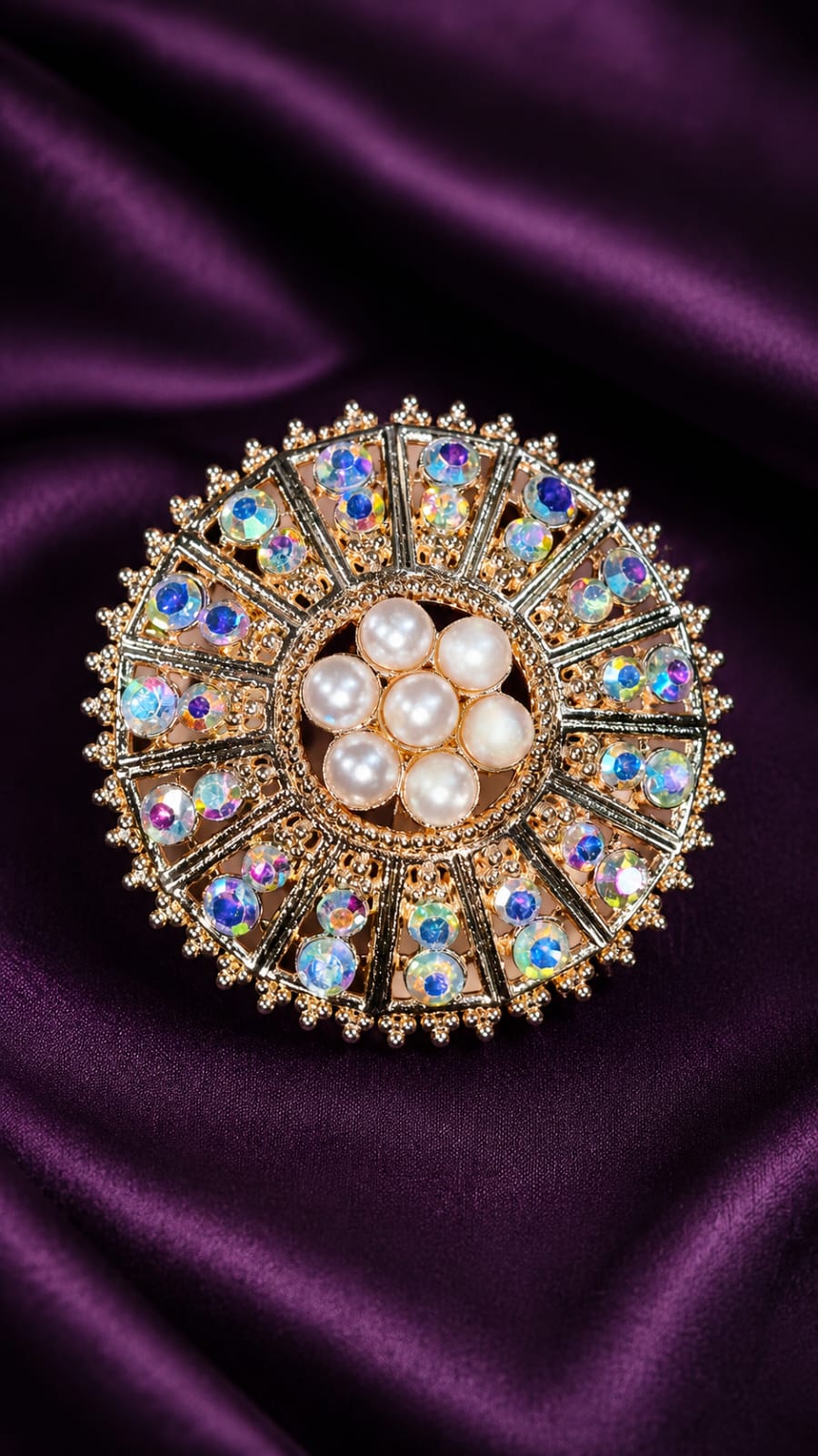 Sunburst statement ring with blue oval stones and clustered white pearls, gold-tone
