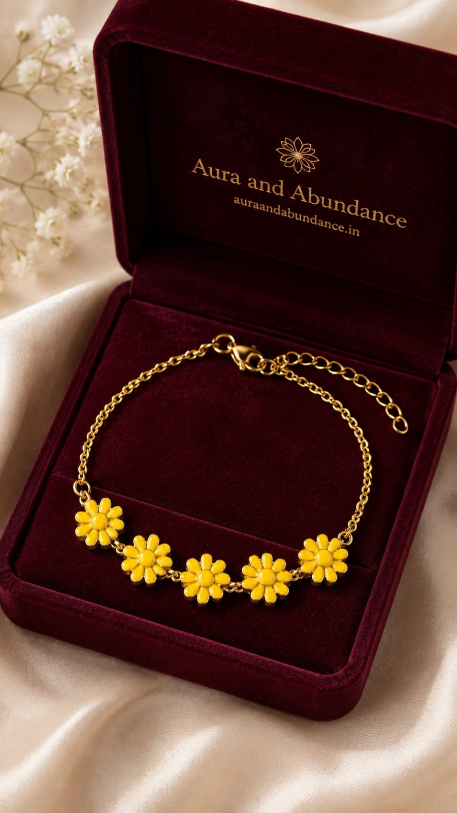 Gold-plated floral charm bracelet with five yellow sunflower-style flower beads