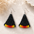 Beaded triangle earrings with black beads, rainbow bead stripe, and silver hooks