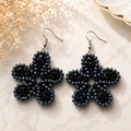 Midnight blue and black beaded floral earrings with dangling hook backs