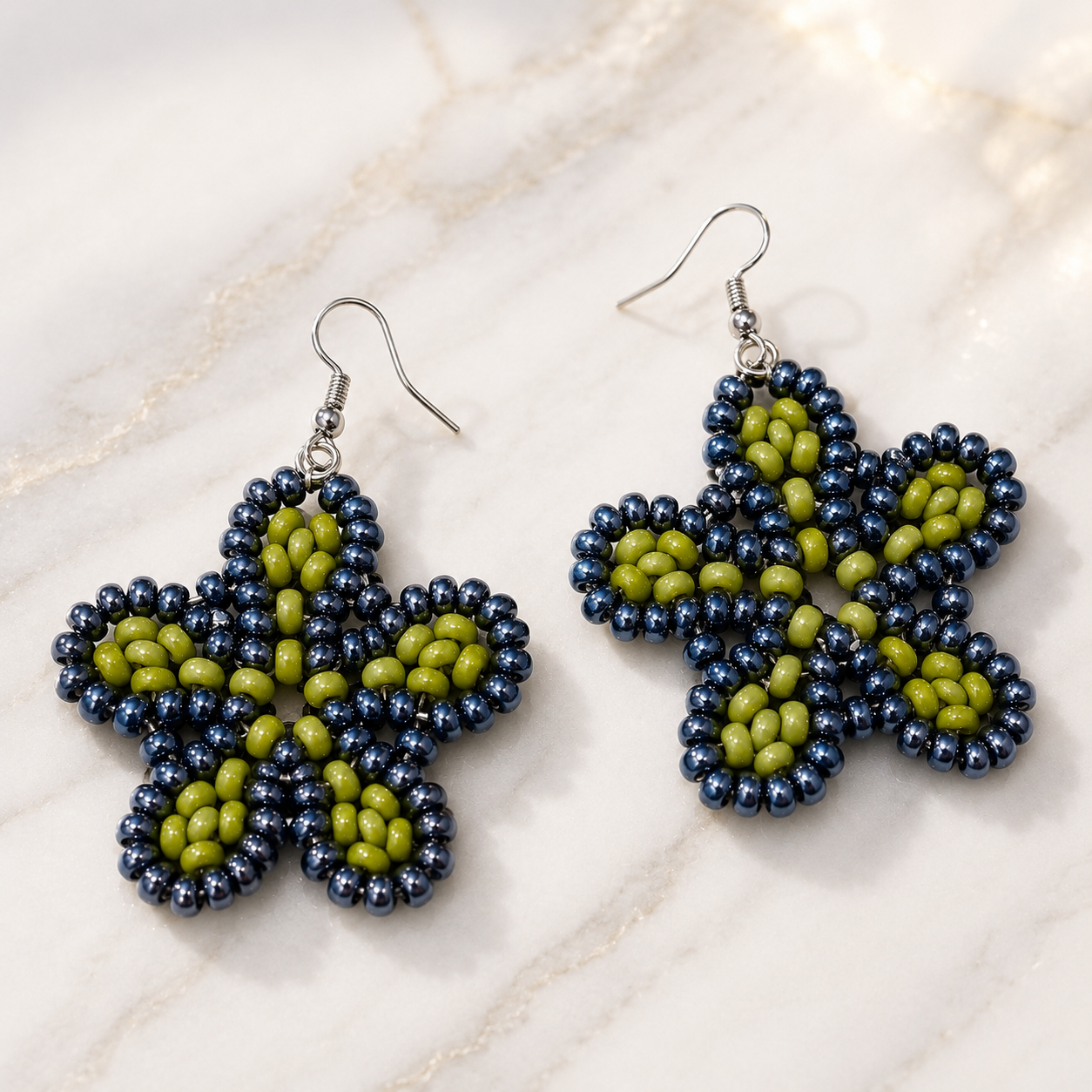 Beaded floral earrings with midnight blue beads and olive green bead centers