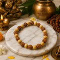 Rudraksha and sandalwood bead bracelet with mixed brown and amber round beads