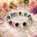 Crystal bead bracelet with mixed purple, green and clear stones, round polished beads