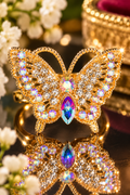 Sparkling butterfly crystal ring with gold-tone band and multicolor marquise stones