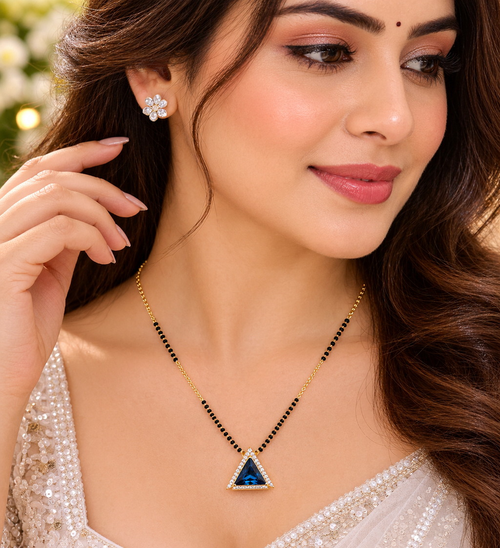Triangle pendant necklace with blue triangular stone and gold-tone black bead chain
