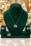 Emerald green bow pendant necklace with matching stud earrings and ring set