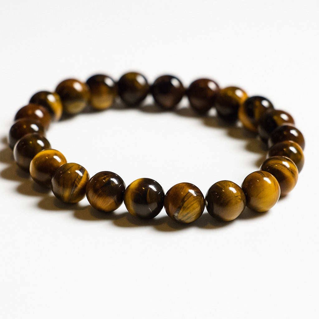 Close-up Tiger’s Eye bracelet: brown and amber round beads with glossy finish