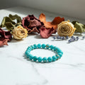 Turquoise crystal bead bracelet with round teal stones