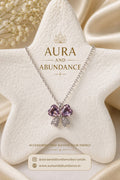 Purple crystal butterfly pendant necklace on silver chain