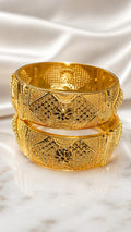 Gold filigree kada bangle with ornate engraved lattice pattern, wide bracelet