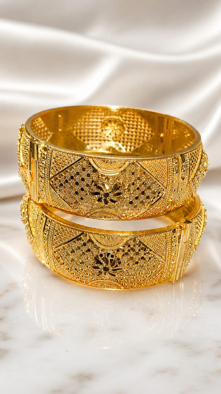 Gold filigree kada bangle with ornate engraved lattice pattern, wide bracelet