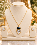 Geometric pendant necklace set with black square and clear teardrop pendant and stud earrings