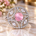 Pink crystal floral statement ring with cat-eye center and clear stones