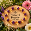 Beaded bracelet with purple and amber crystal-like stones in round links