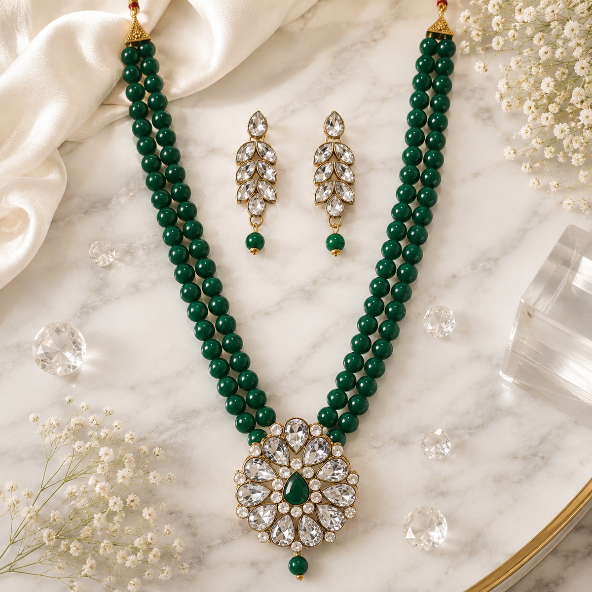 Emerald green bead double-strand necklace with floral pendant and teardrop earrings