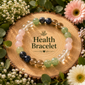 Health bracelet with 8mm multi-crystal beads: green, black, clear and pink.